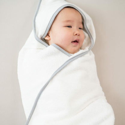 Hooded Bath Towel in Cloud with Storm Trim | Kyte Baby