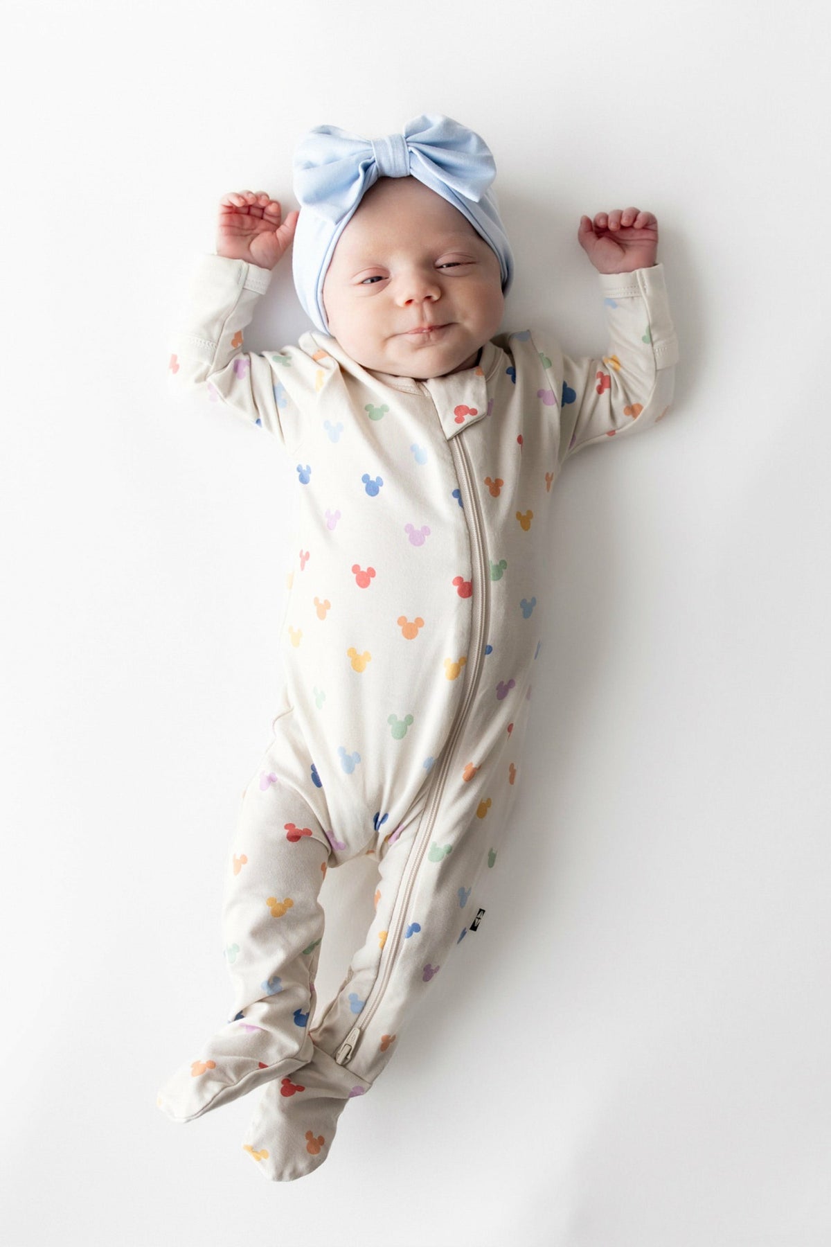 Zippered Footie in Pastel Mickey Mouse | Kyte Baby