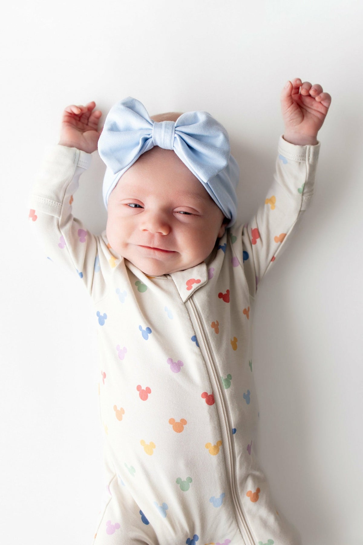 Zippered Footie in Pastel Mickey Mouse | Kyte Baby
