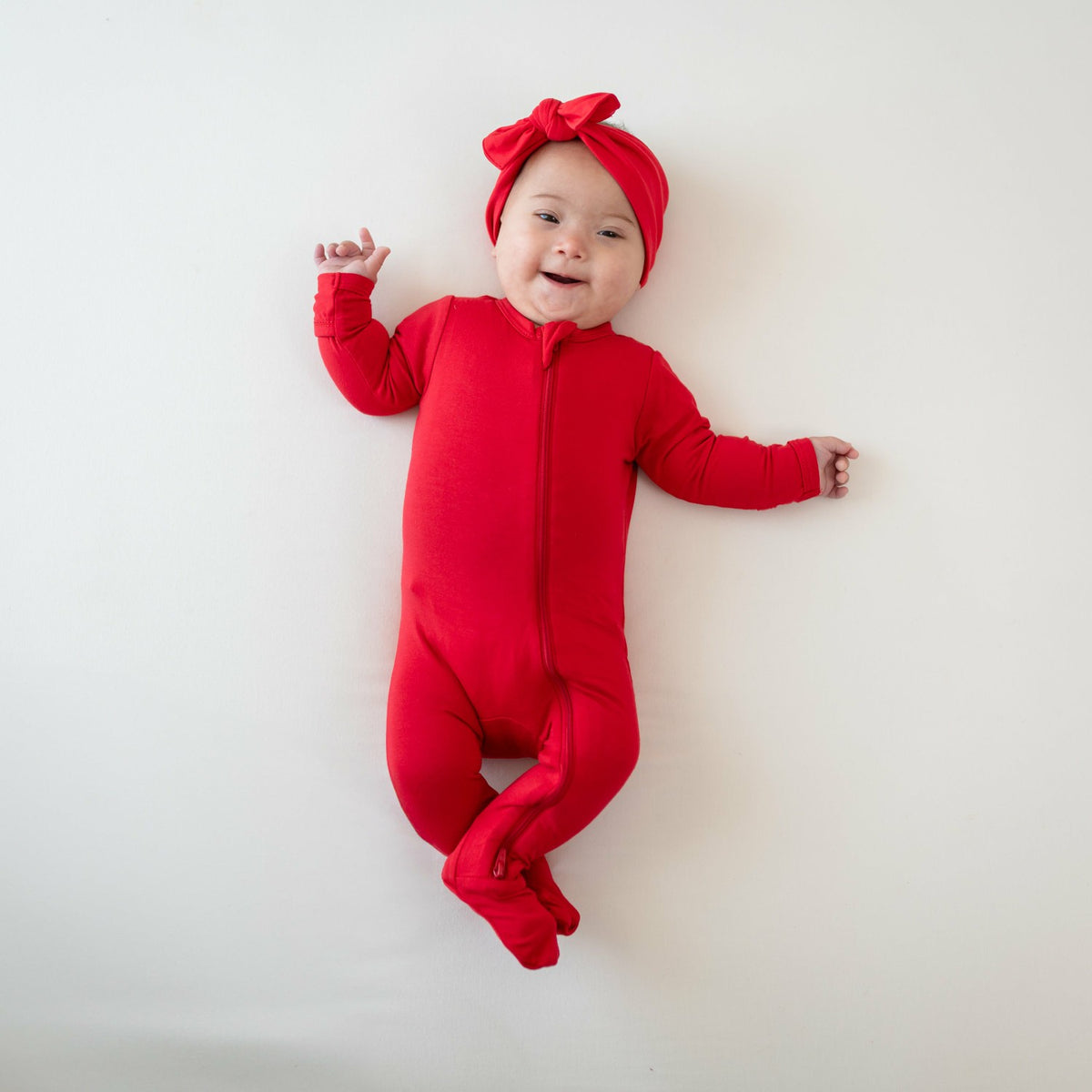 Zippered Footie in Cardinal | Kyte Baby