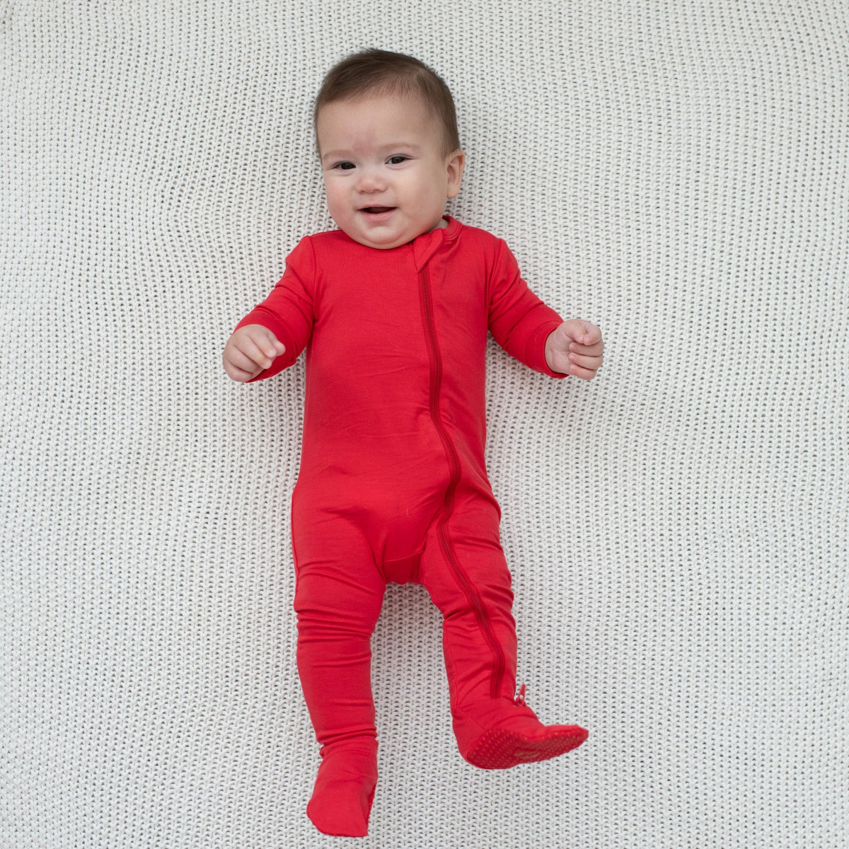 Zippered Footie in Cardinal | Kyte Baby