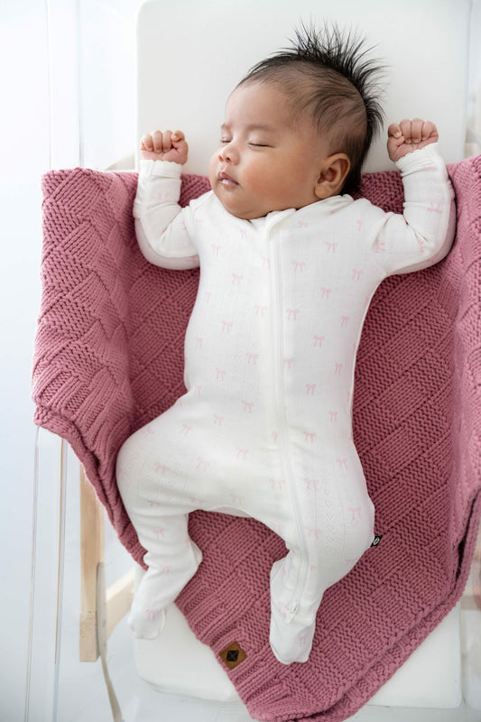 Pointelle Zippered Footie in Sweet Pink Bow | Kyte Baby
