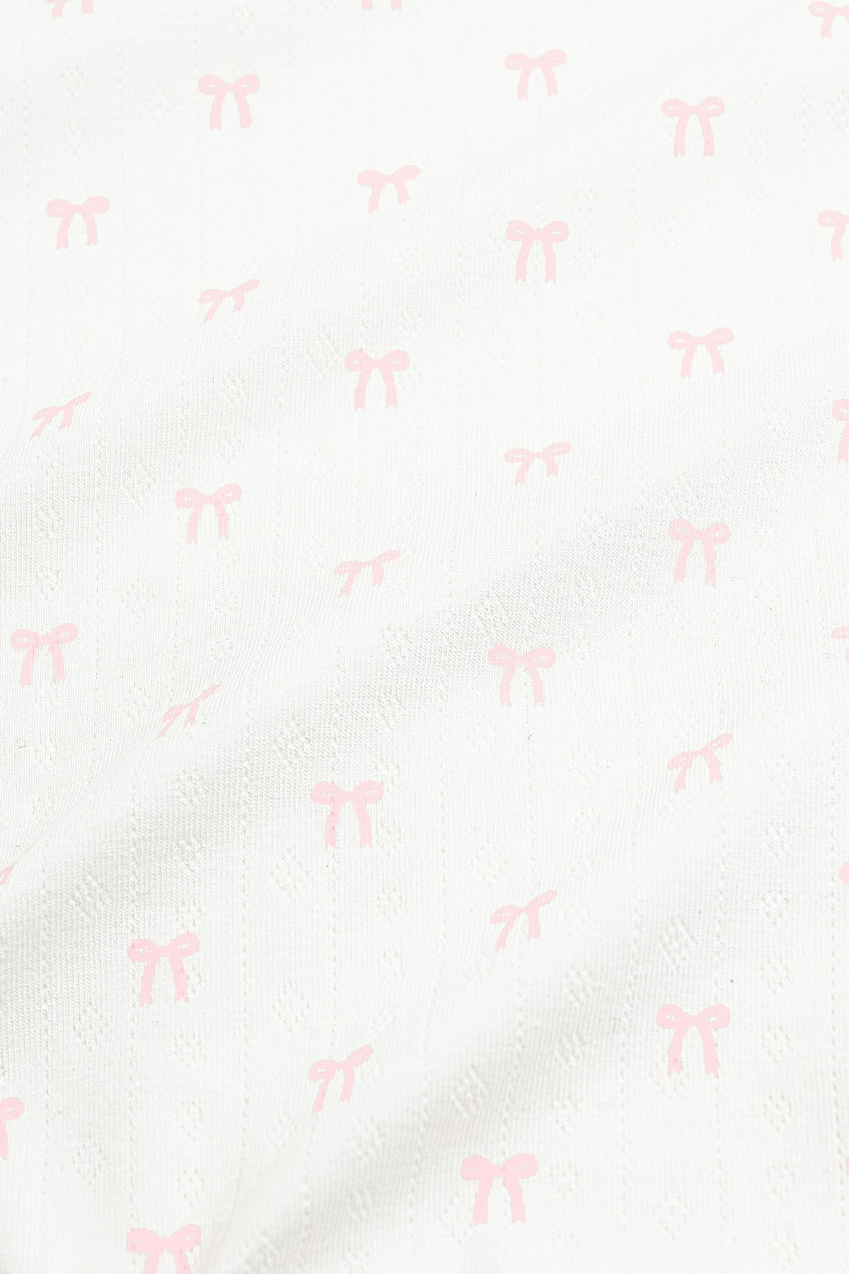 Pointelle Zippered Footie in Sweet Pink Bow | Kyte Baby