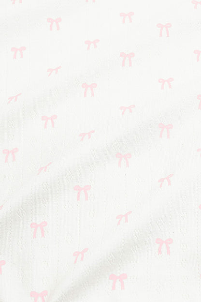 Pointelle Zippered Footie in Sweet Pink Bow | Kyte Baby
