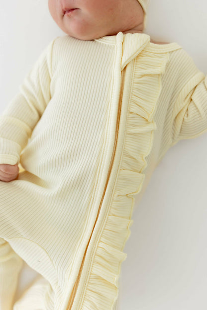 Ribbed Ruffle Zipper Footie in Chamomile | Kyte Baby