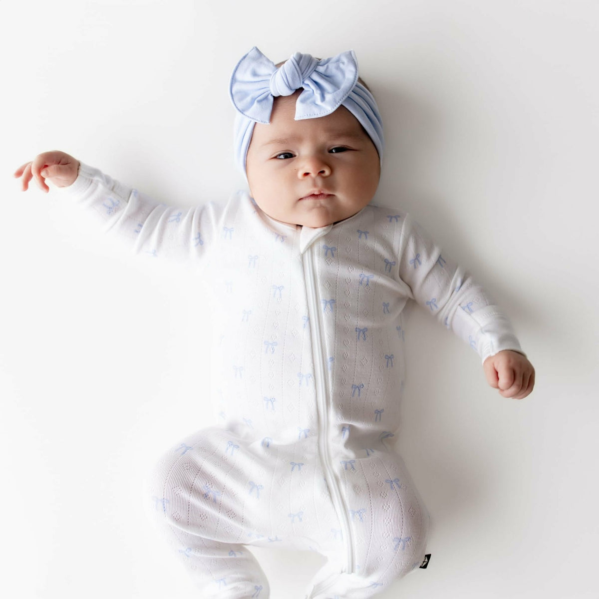 Pointelle Zippered Footie in Sweet Blue Bow | Kyte Baby