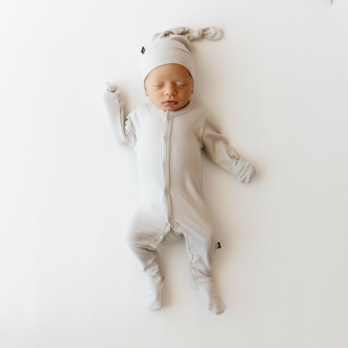 Footie Pajamas in Oat | Kyte Baby