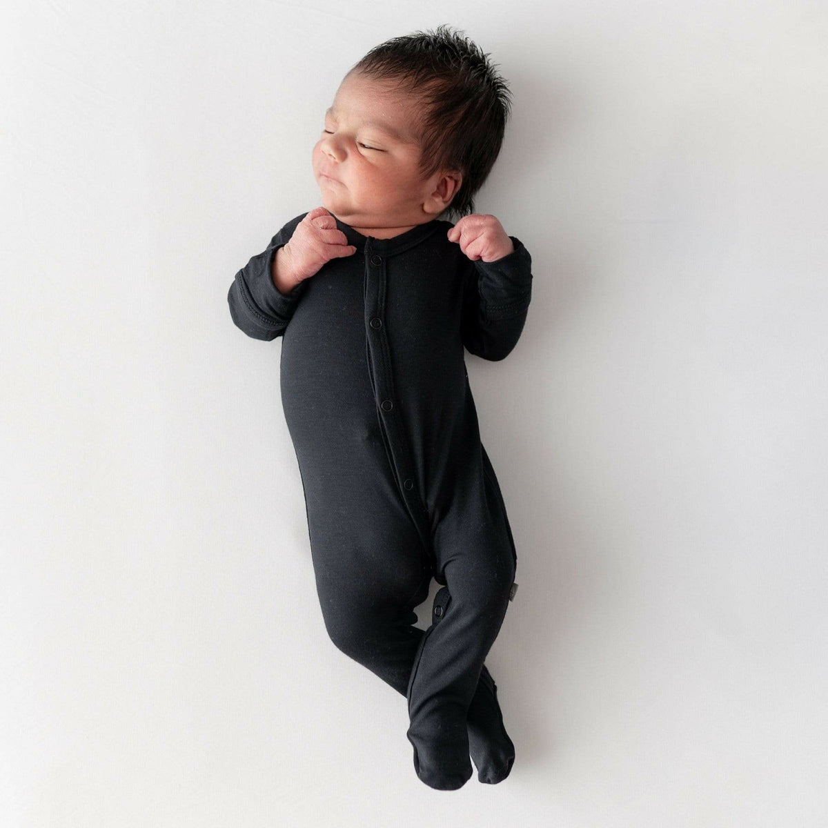 Footie Pajamas in Midnight | Kyte Baby
