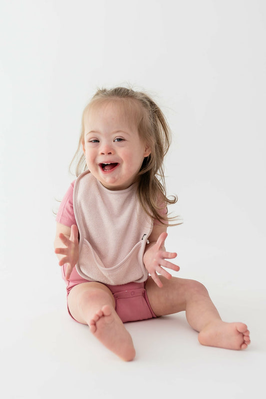 Terry Pocket Bib in Blush | Kyte Baby
