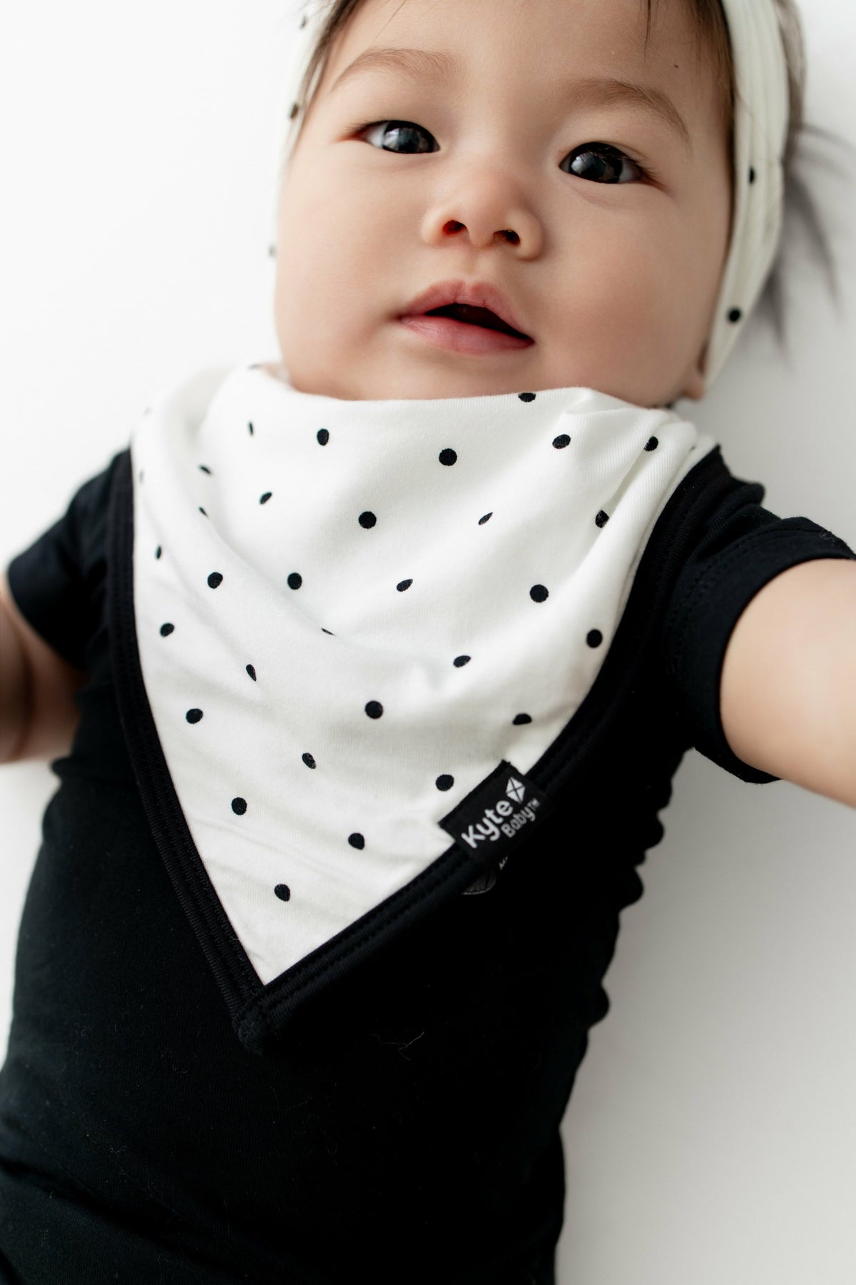 Bib in Midnight Polka Dot | Kyte Baby