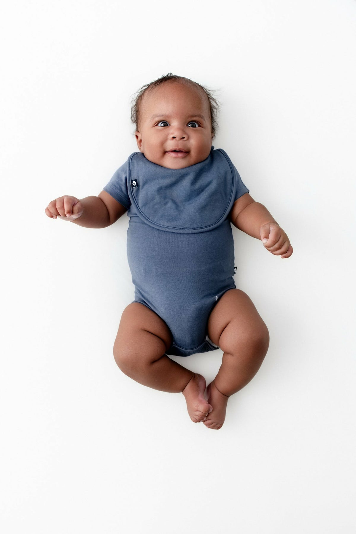 Cushy Bib in Oxford | Kyte Baby