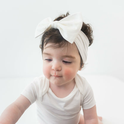 Bow Headband in Cloud | Kyte Baby