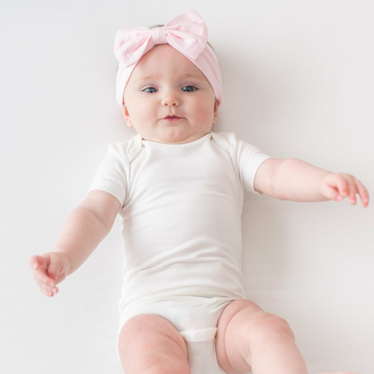 Bow Headband in Sakura | Kyte Baby
