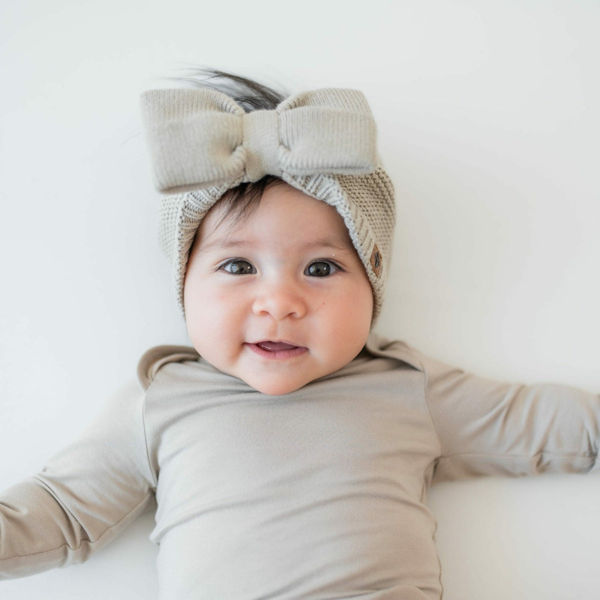 Chunky Knit Bow Headband in Almond | Kyte Baby
