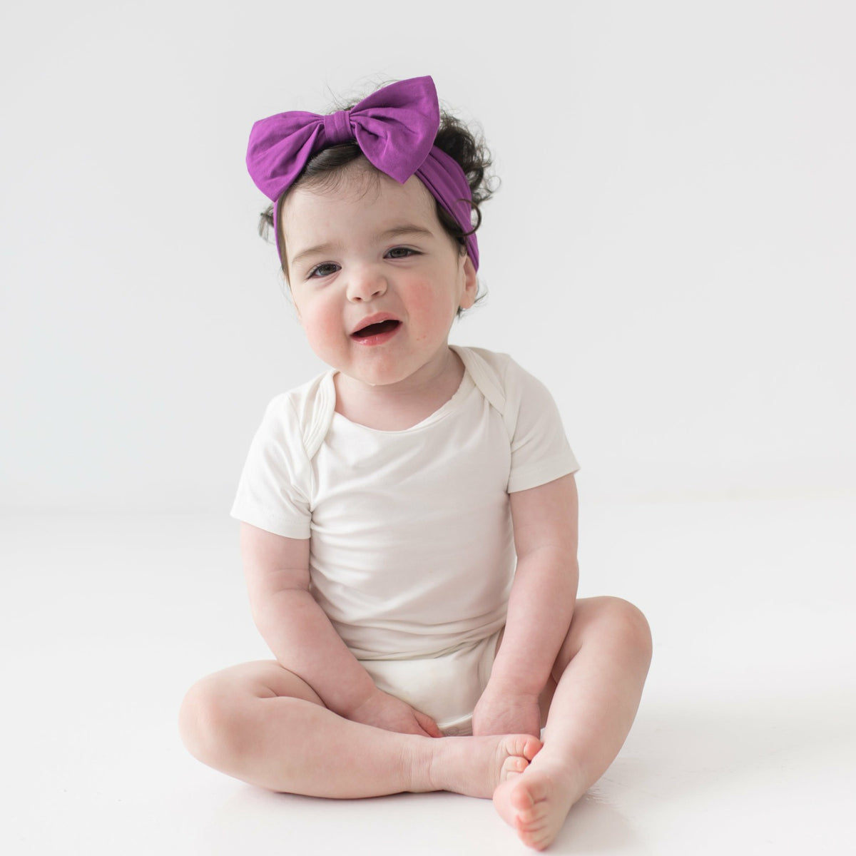 Bow Headband in Berry | Kyte Baby