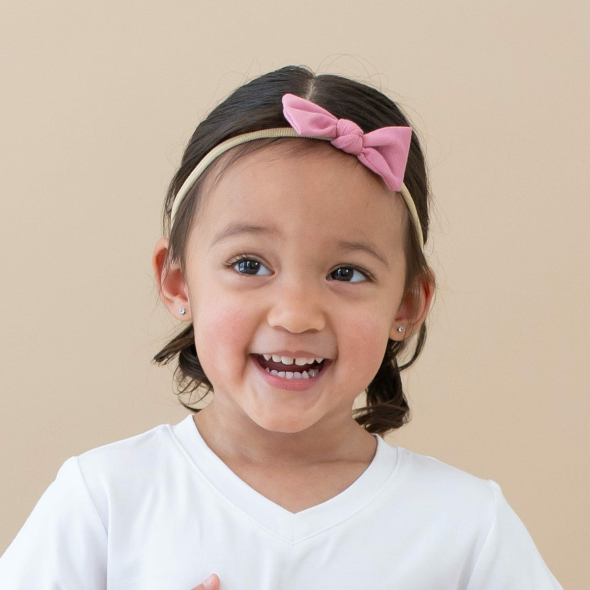 Tiny Nylon Bow in Apple Blossom | Kyte Baby