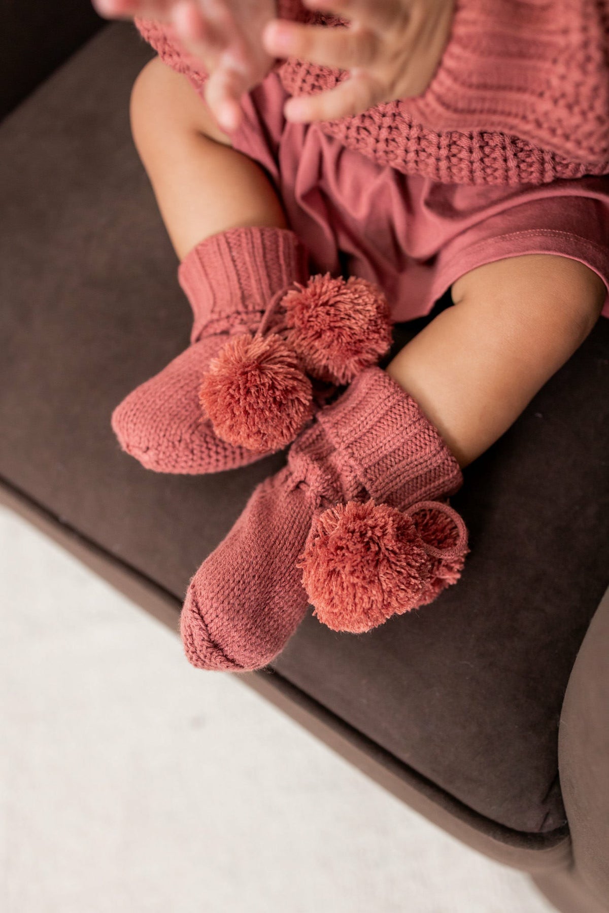 Knit Booties in Ember | Kyte Baby