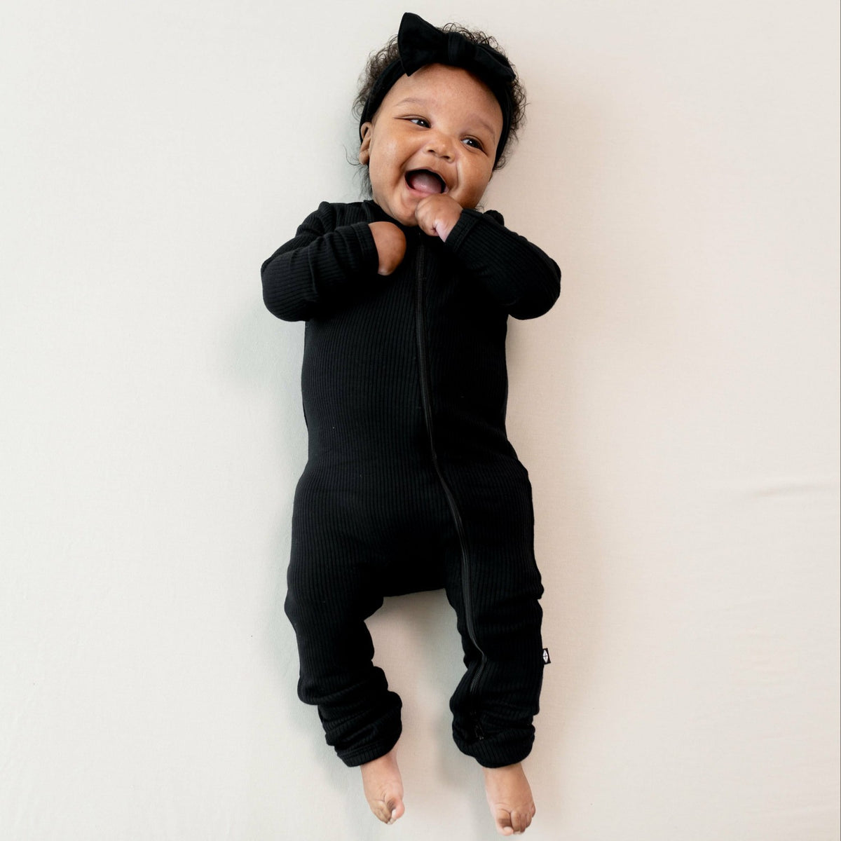 Ribbed Zipper Romper in Midnight | Kyte Baby