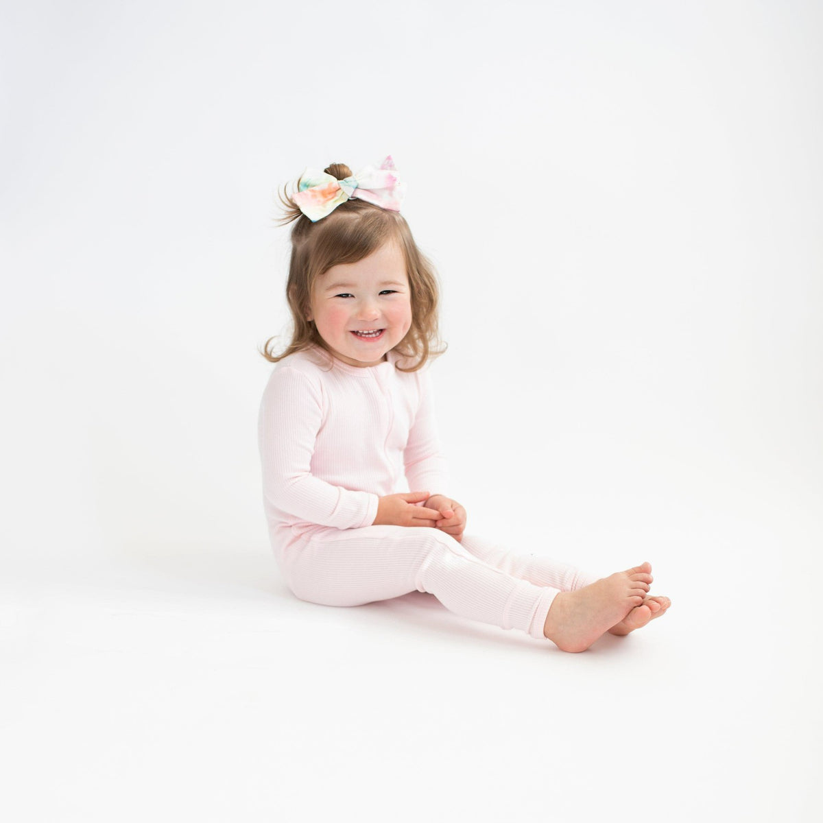 Ribbed Zipper Romper in Sakura | Kyte Baby