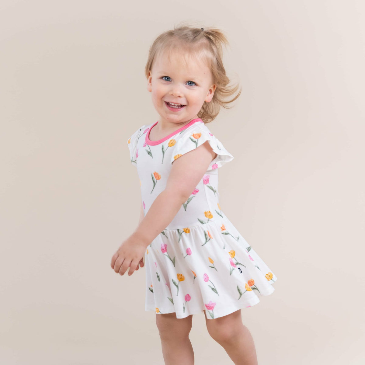 Twirl Bodysuit Dress in Tulip | Kyte Baby