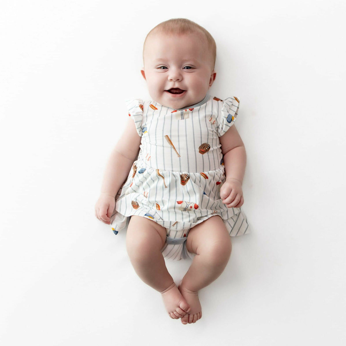 Twirl Bodysuit Dress in Home Run | Kyte Baby