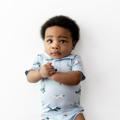 Polo Bodysuit in Take Off | Kyte Baby