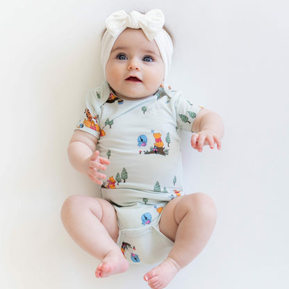 Bodysuit in Winnie the Pooh Hundred Acre Wood | Kyte Baby