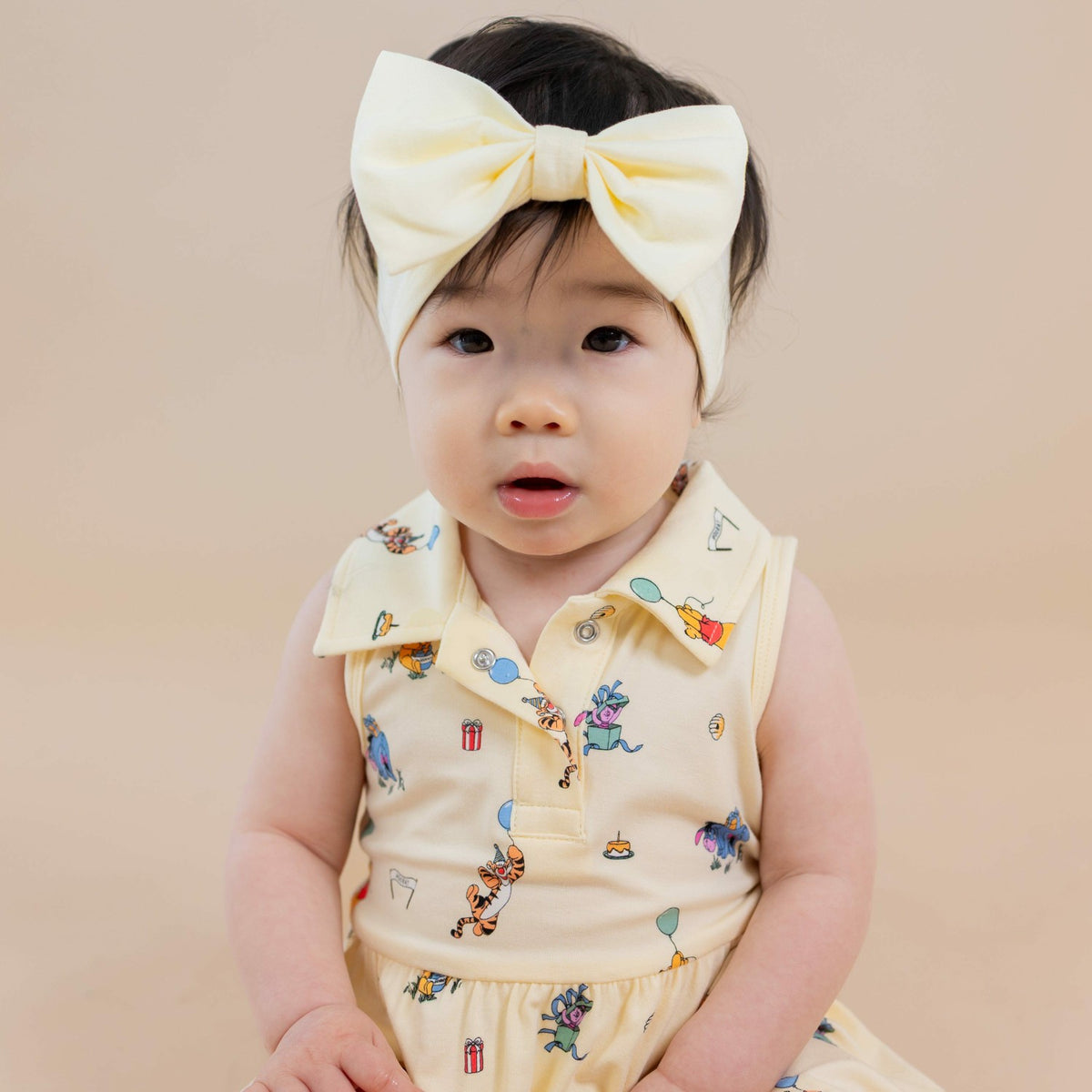 Polo Bodysuit Dress in Winnie the Pooh Celebration | Kyte Baby
