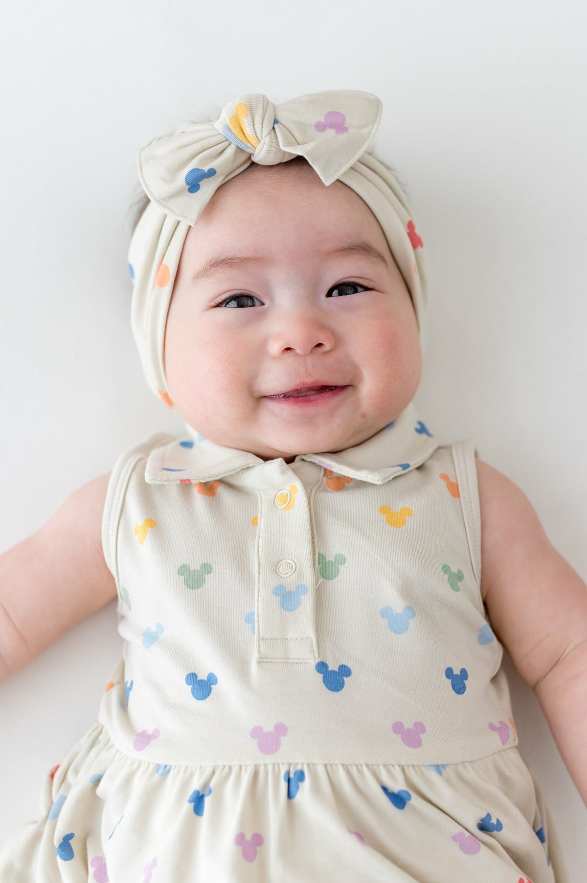 Polo Bodysuit Dress in Pastel Mickey Mouse | Kyte Baby