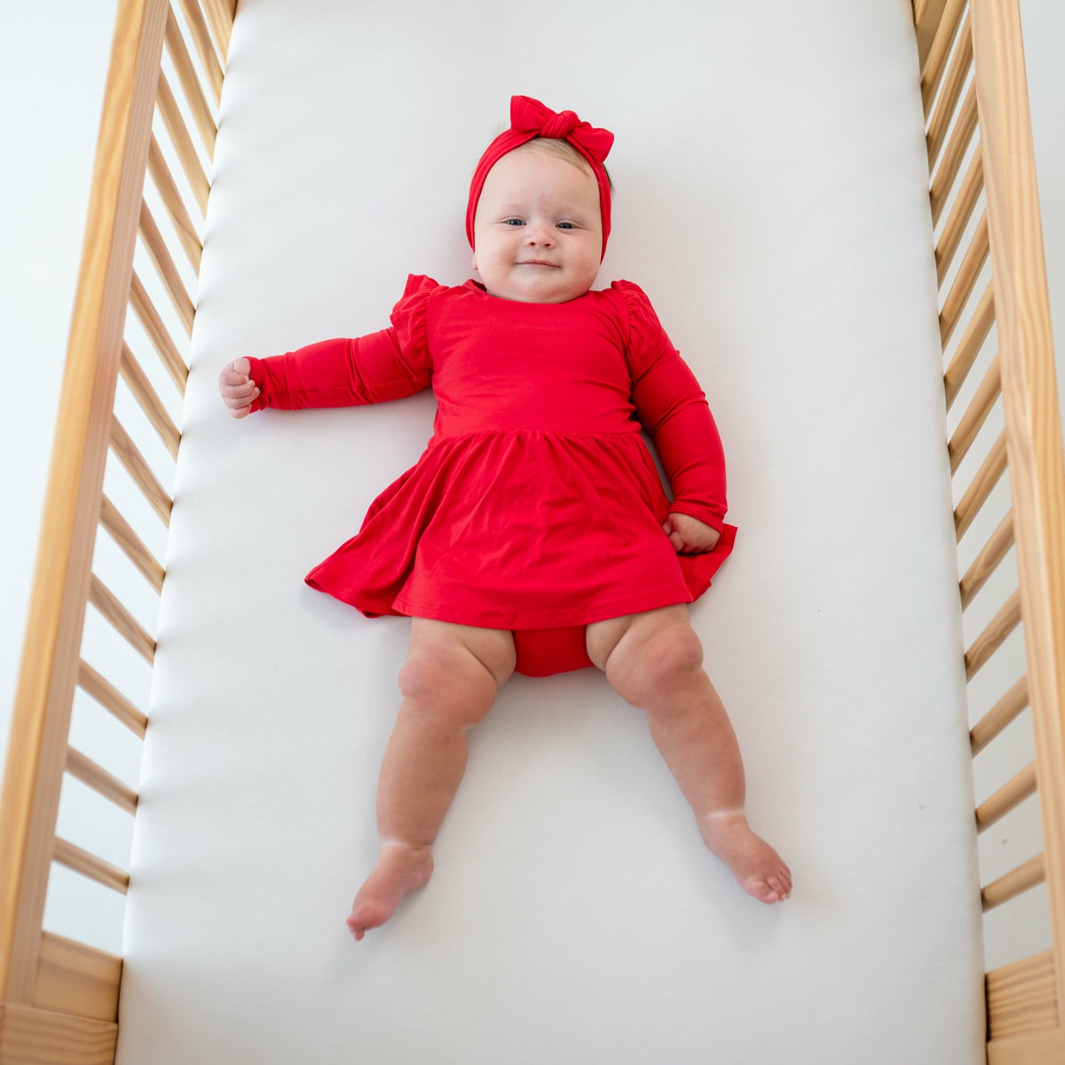 Long Sleeve Twirl Bodysuit Dress in Cardinal | Kyte Baby