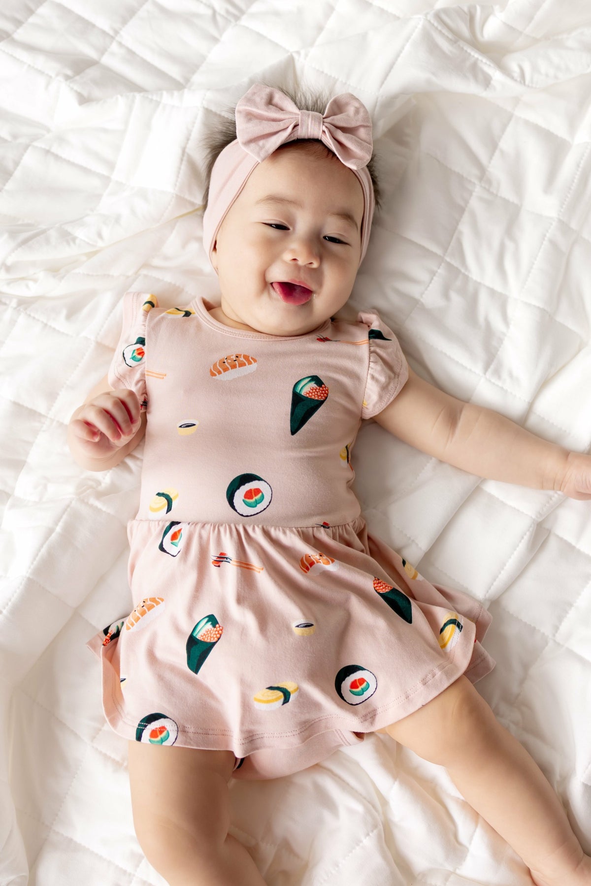 Twirl Bodysuit Dress in Blush Sushi | Kyte Baby