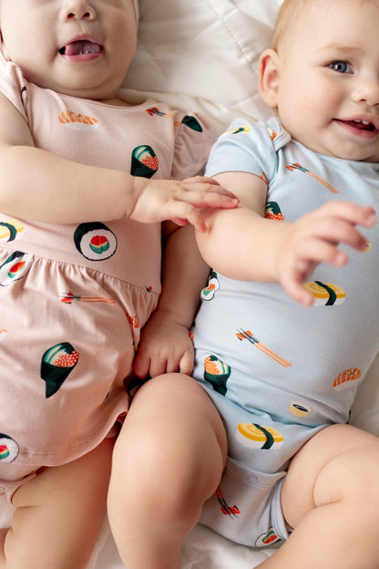 Twirl Bodysuit Dress in Blush Sushi | Kyte Baby
