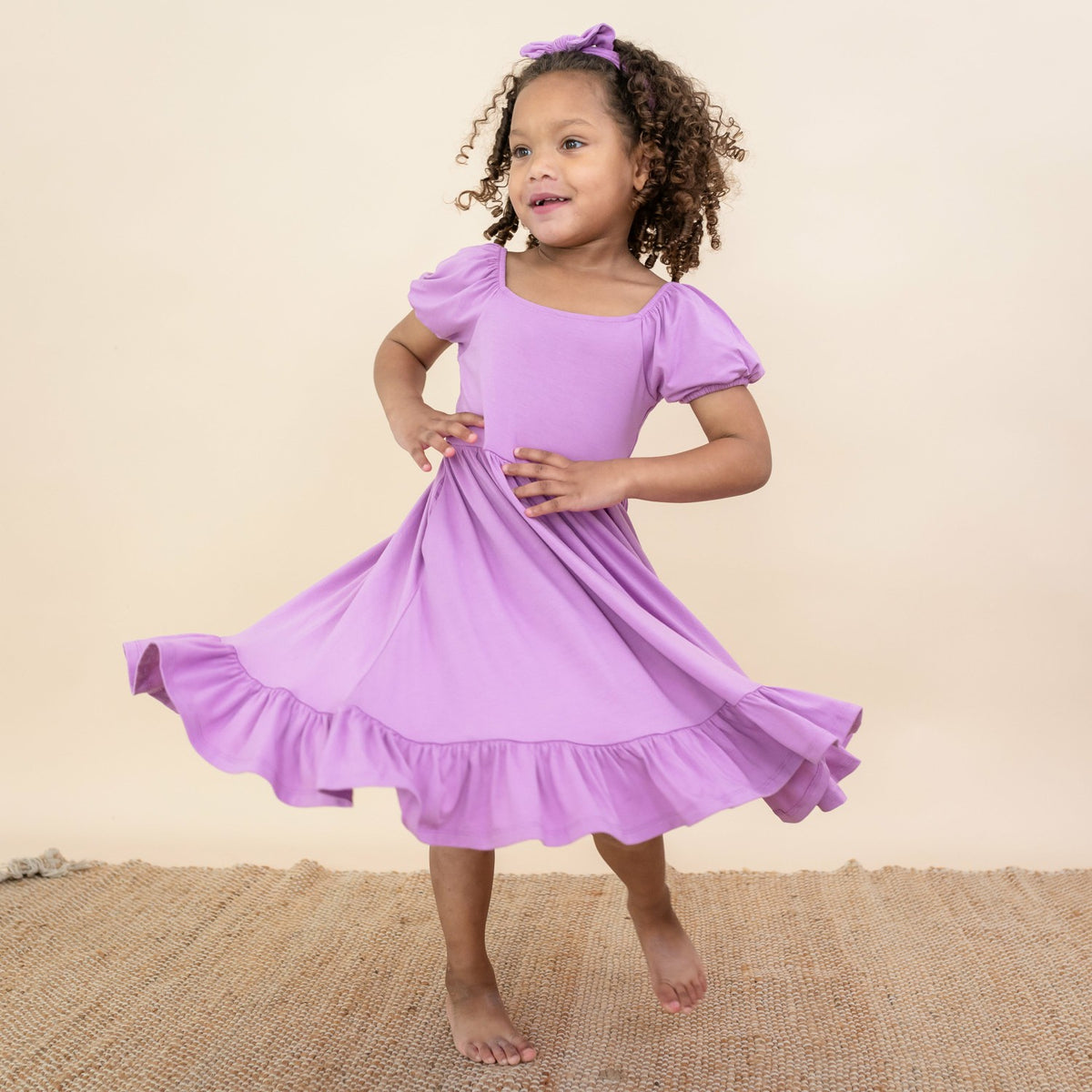 Puff Sleeve Twirl Dress in Poi | Kyte Baby