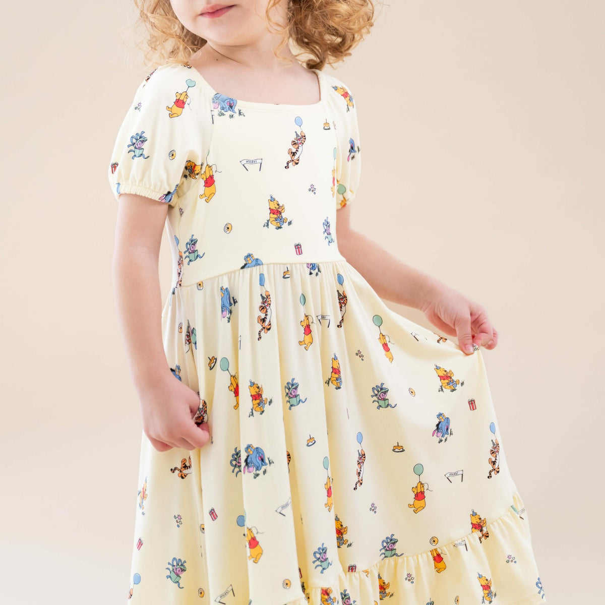 Puff Sleeve Twirl Dress in Winnie the Pooh Celebration | Kyte Baby