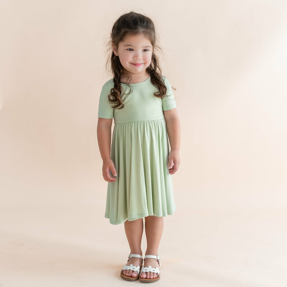 Twirl Dress in Basil | Kyte Baby