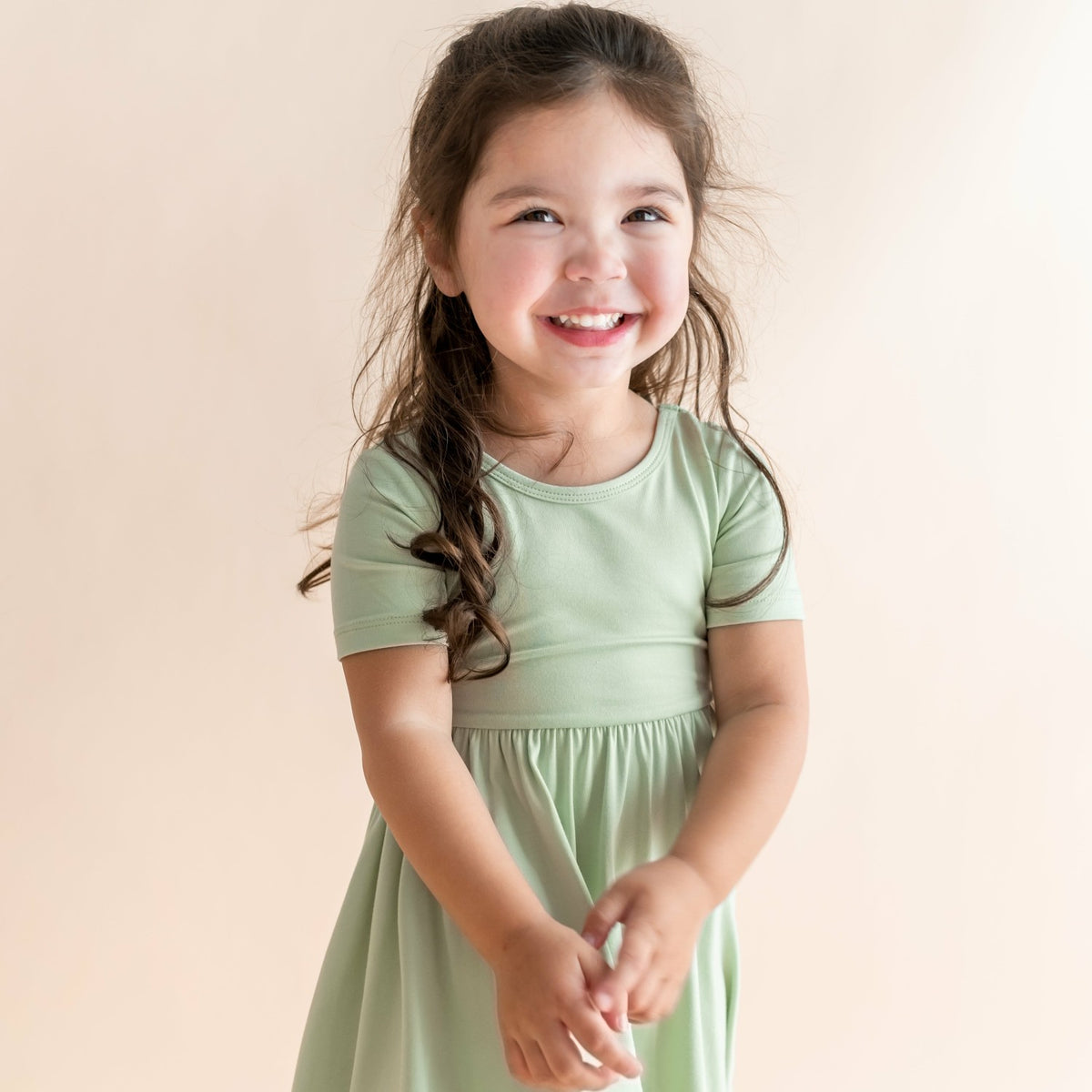 Twirl Dress in Basil | Kyte Baby