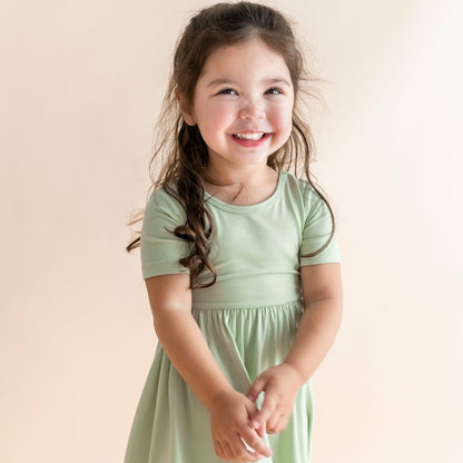 Twirl Dress in Basil | Kyte Baby