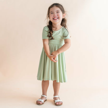Twirl Dress in Basil | Kyte Baby