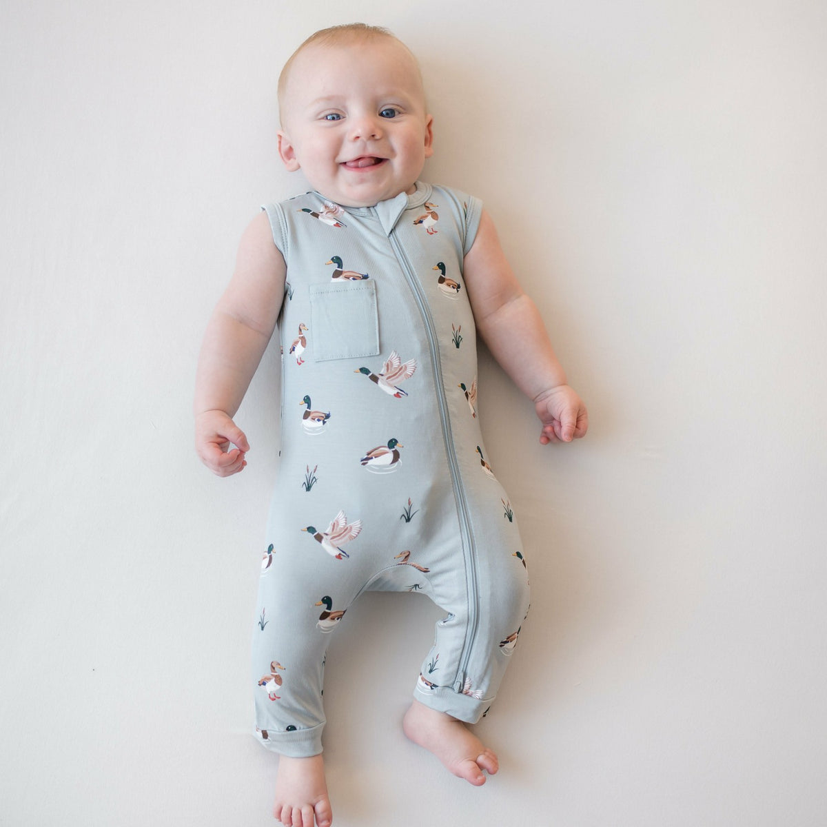 Zippered Sleeveless Romper in Mallard Duck | Kyte Baby