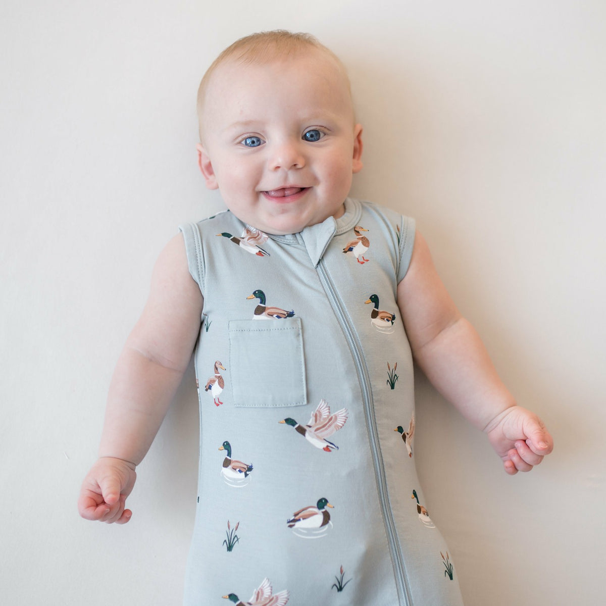Zippered Sleeveless Romper in Mallard Duck | Kyte Baby
