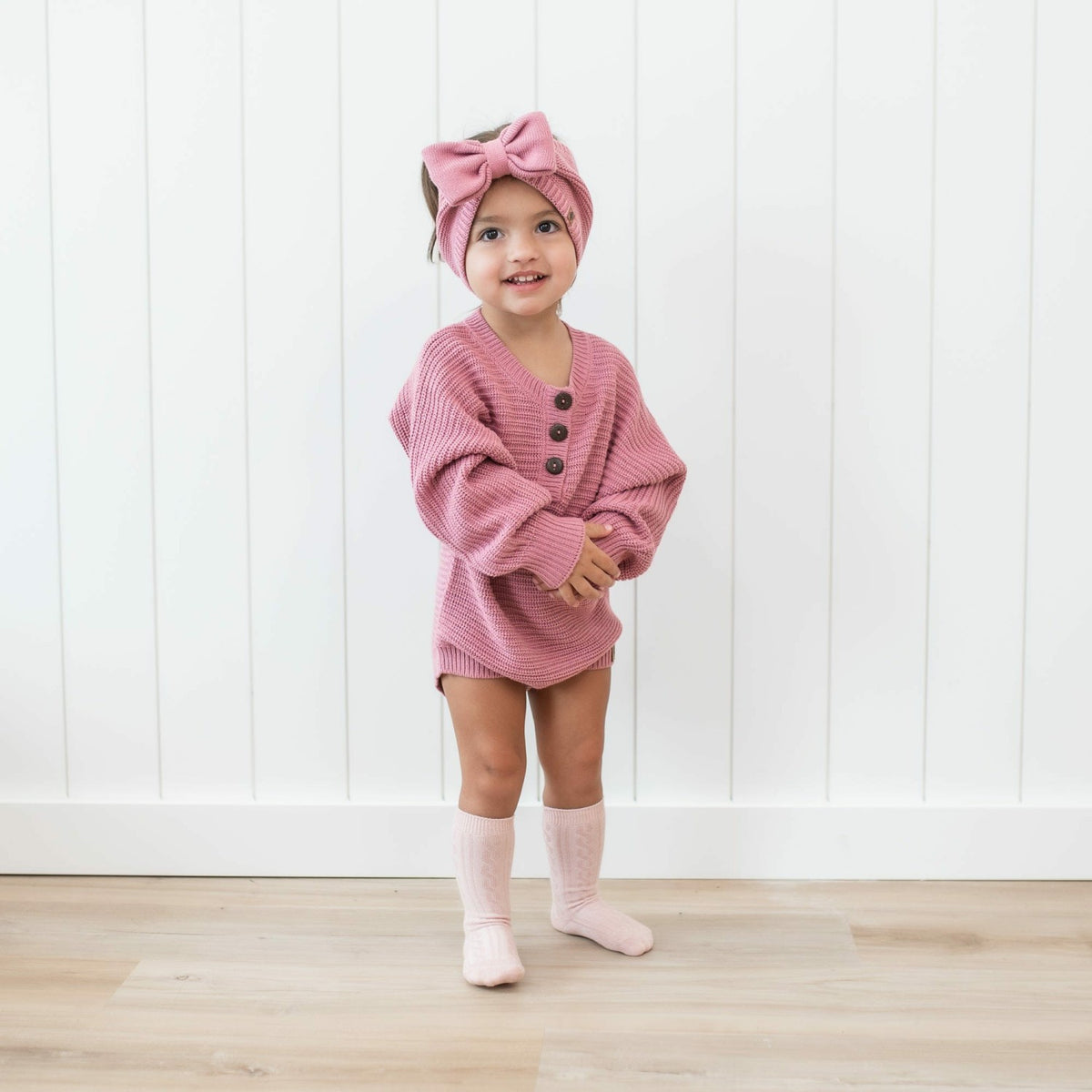 Chunky Knit Bow Headband in Apple Blossom | Kyte Baby