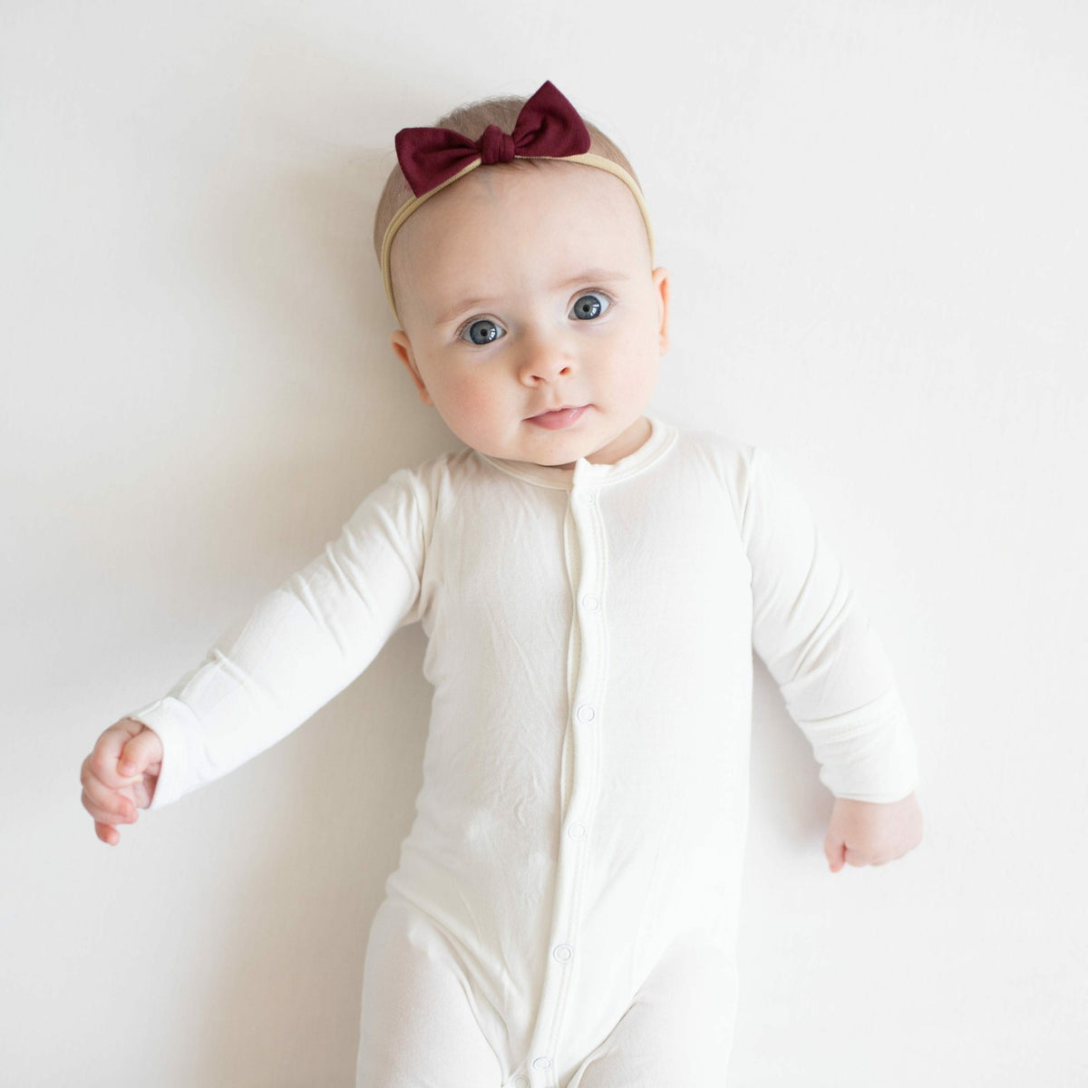 Tiny Nylon Bow in Burgundy | Kyte Baby