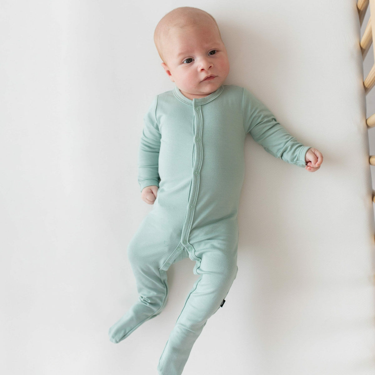 Footie Pajamas in Sage | Kyte Baby