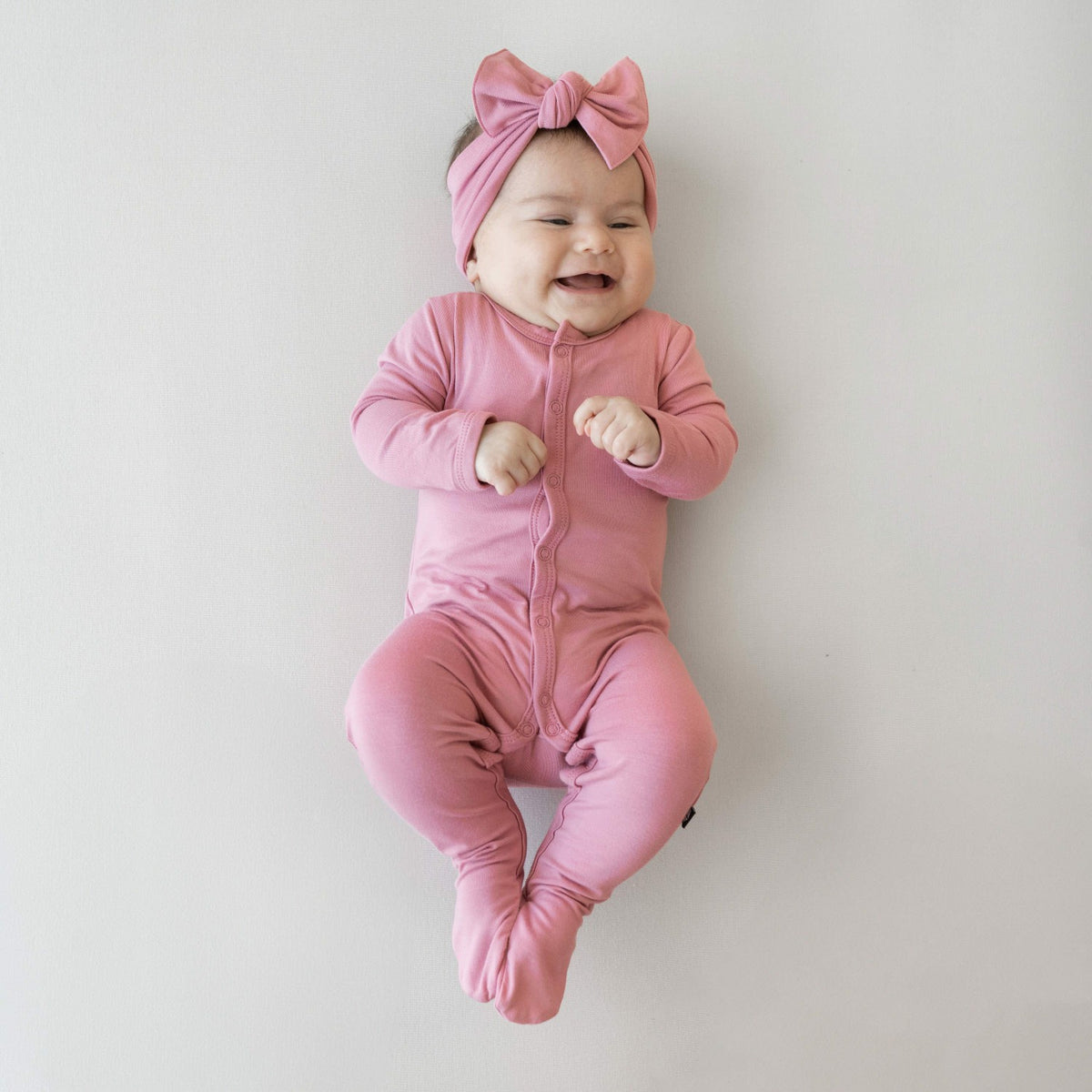 Bamboo Footie in Apple Blossom | Kyte Baby
