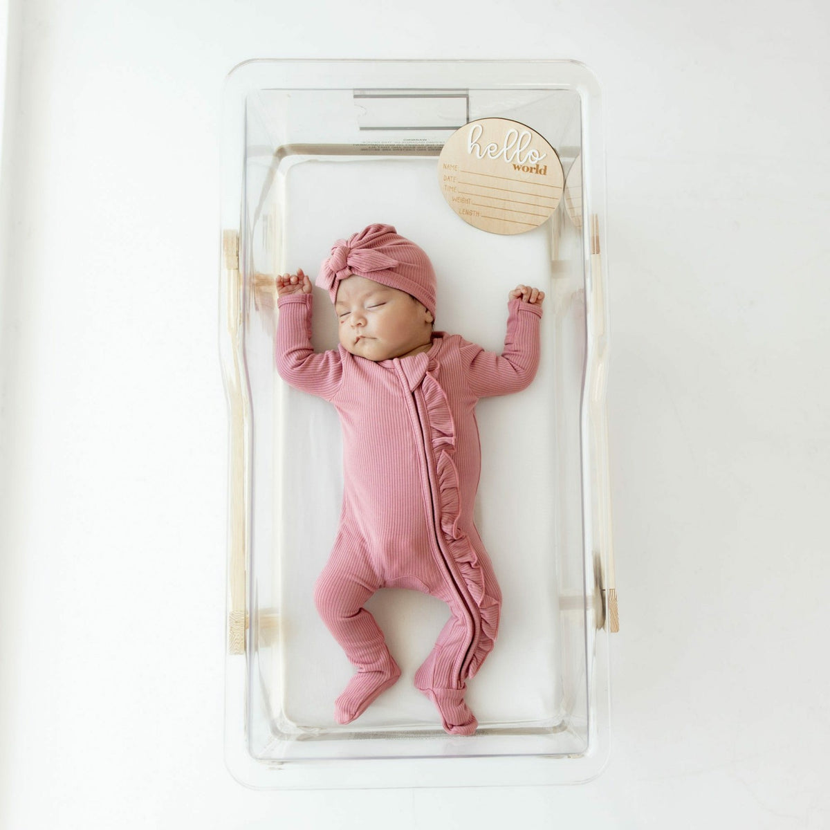 Ribbed Ruffle Zipper Footie in Apple Blossom | Kyte Baby