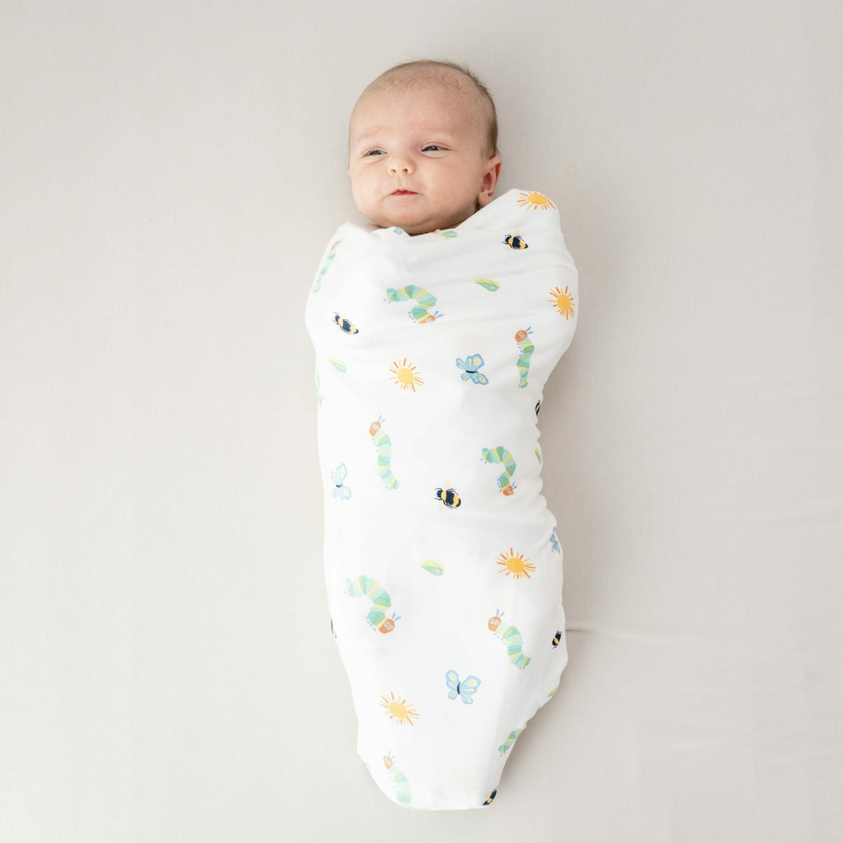 Swaddle Blanket in The Very Hungry Caterpillar™ and Friends | Kyte Baby