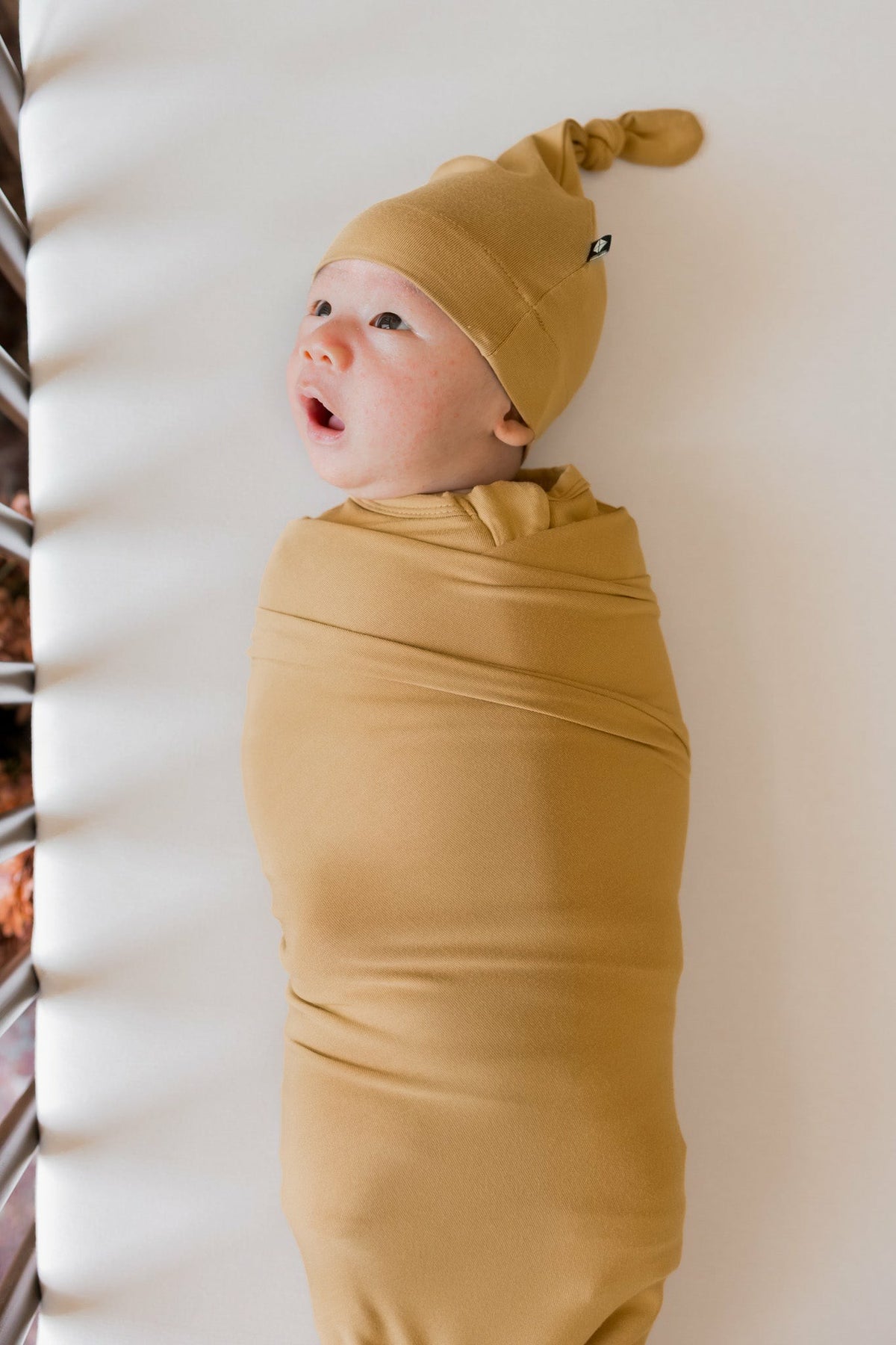Swaddle Blanket in Ochre | Kyte Baby