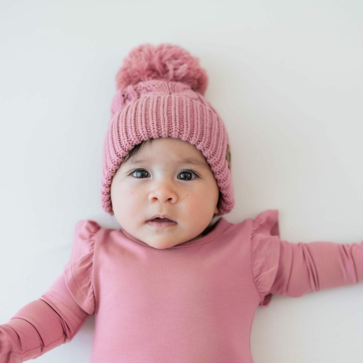 Chunky Cable Knit Beanie in Apple Blossom | Kyte Baby