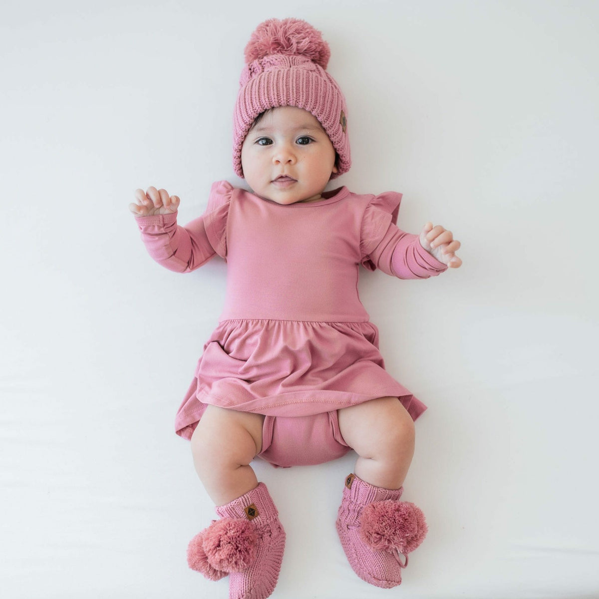 Chunky Cable Knit Beanie in Apple Blossom | Kyte Baby