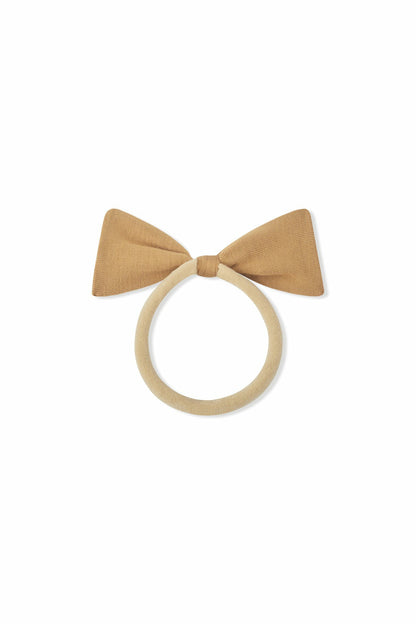 Tiny Nylon Bow in Ochre | Kyte Baby